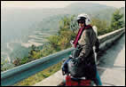 Marlane on a moped